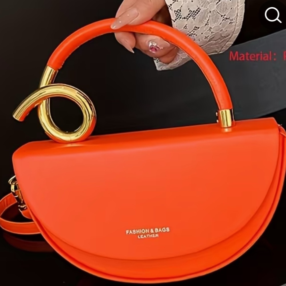 Vibrant Orange Handbag with Gold Accent